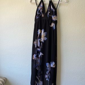 Tropical black halter dress with blue flowers and hi-lo hem
